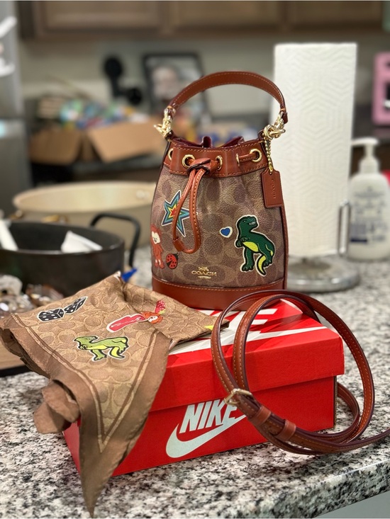 Coach Handbags - Coach Dempsey mini bucket bag in sticker print bundle!!!